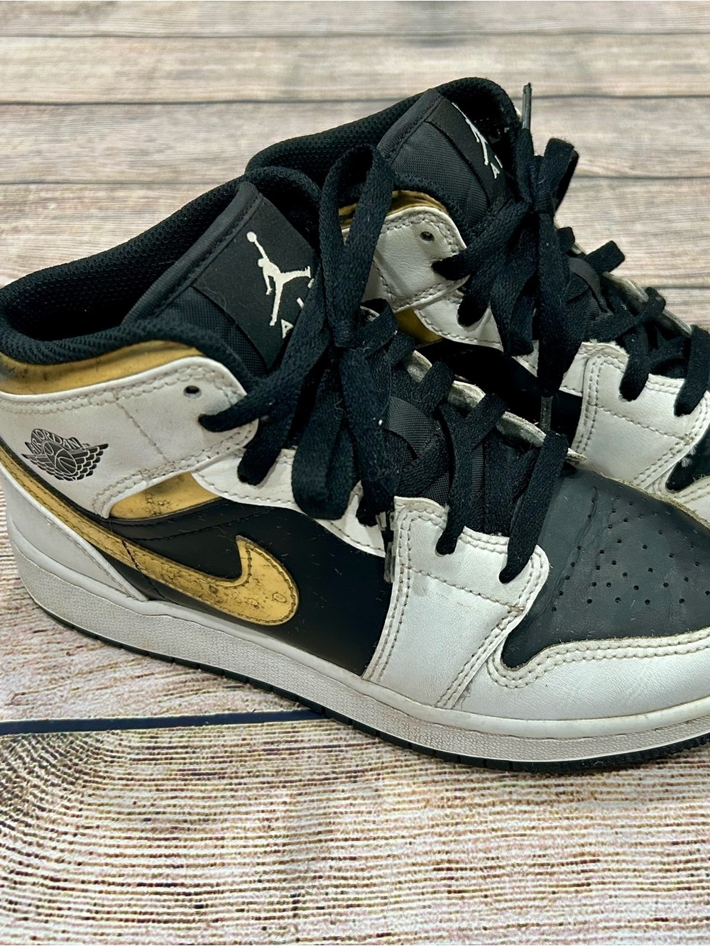 Nike Air Jordan Metallic Gold, Black and White Big Kids size 5 sneakers.